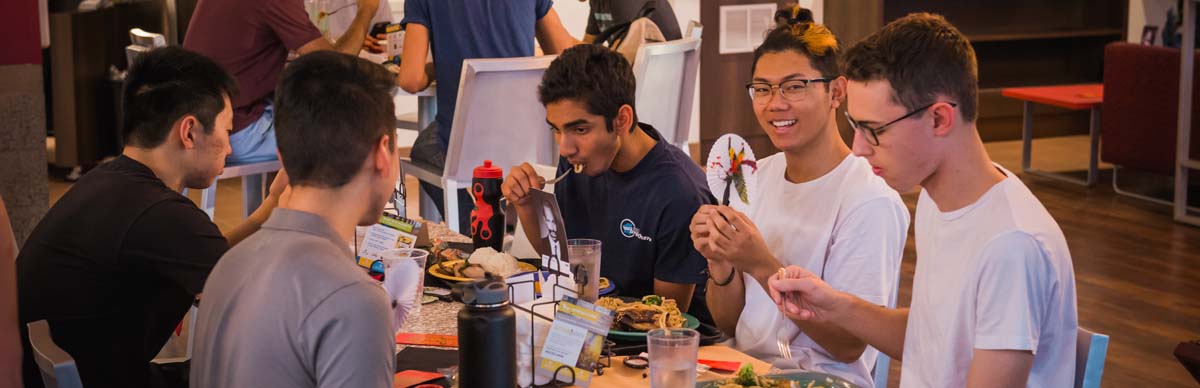 Students eating at table for Lunar New Year